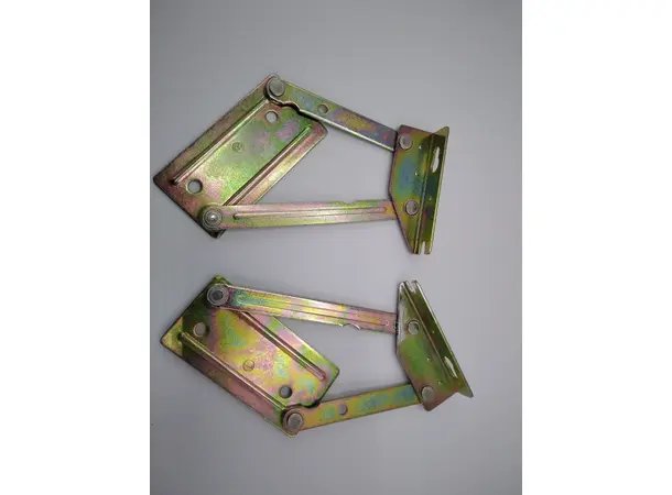 Pianohengsel i messing | Caravan.no