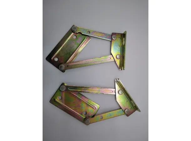 Pianohengsel i messing | Caravan.no